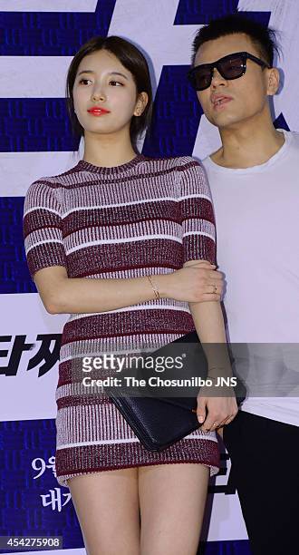 Su-Zy of Miss A and Park Jin-Young pose for photographs during the movie "Tazza: The High Rollers 2" VIP premiere at Geondae Lotte Cinema on August...
