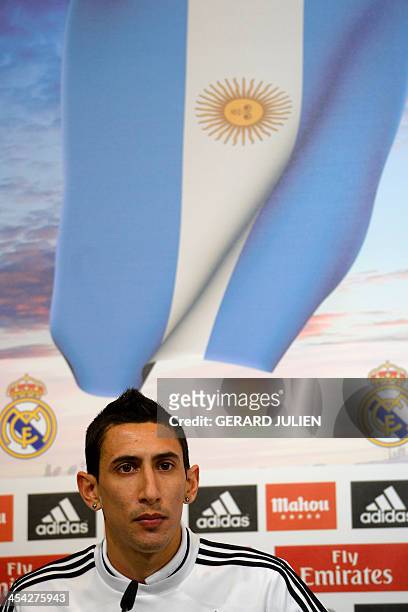 Real Madrid's Argentinian midfielder Angel di Maria looks on as he gives a press conference with his teammates to give their thoughts on 2014 World...