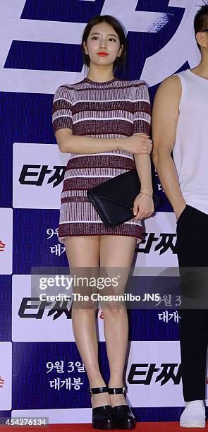 Su-Zy of Miss A poses for photographs during the movie "Tazza: The High Rollers 2" VIP premiere at Geondae Lotte Cinema on August 25, 2014 in Seoul,...