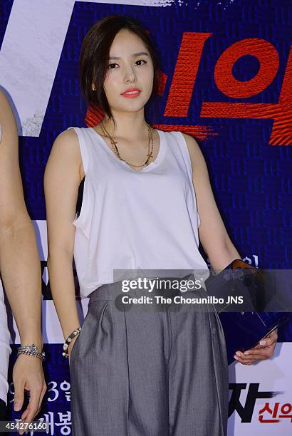 Min Hyo-Lyn poses for photographs during the movie "Tazza: The High Rollers 2" VIP premiere at Geondae Lotte Cinema on August 25, 2014 in Seoul,...