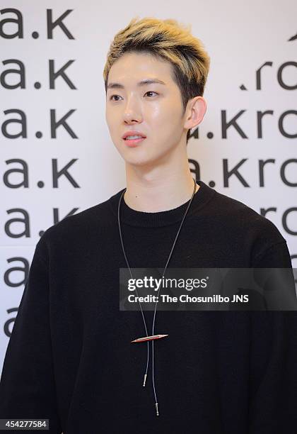 Jo-Kwon of 2AM poses for photographs during the ROSA.K X Nich Khun showcase at Lotte Hotel World on August 26, 2014 in Seoul, South Korea.