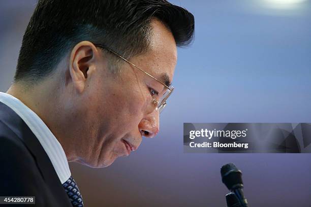 Wang Dongjin, president of PetroChina Co., attends a news conference in Hong Kong, China, on Thursday, Aug. 28, 2014. PetroChina, the nations biggest...