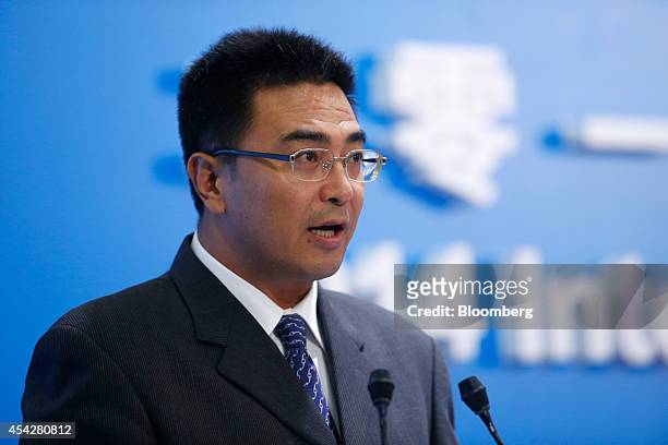 Yu Yibo, chief financial officer of PetroChina Co., speaks during a news conference in Hong Kong, China, on Thursday, Aug. 28, 2014. PetroChina, the...