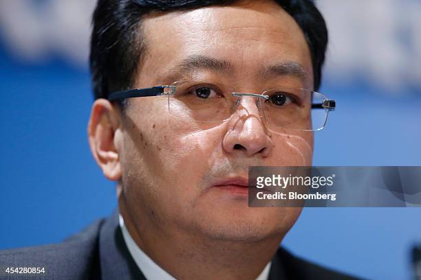 Sun Longde, vice president at PetroChina Co., attends a news conference in Hong Kong, China, on Thursday, Aug. 28, 2014. PetroChina, the nations...