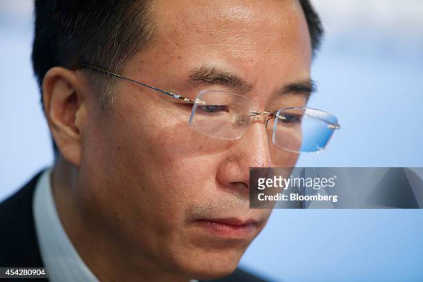 Wang Dongjin, president of PetroChina Co., attends a news conference in Hong Kong, China, on Thursday, Aug. 28, 2014. PetroChina, the nations biggest...