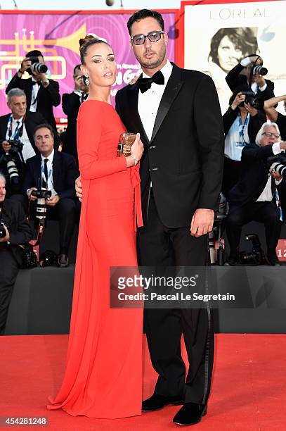 Laura Calvo and Lorenzo Tonetti attend the Opening Ceremony and 'Birdman' premiere during the 71st Venice Film Festival on August 27, 2014 in Venice,...