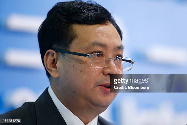 Sun Longde, vice president at PetroChina Co., speaks during a news conference in Hong Kong, China, on Thursday, Aug. 28, 2014. PetroChina, the...
