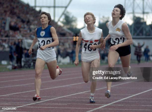 Rosemary Stirling of Scotland wins the women's 800 metres final from Pat Lowe of England and Cheryl Peasley of Australia during the British...