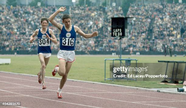 Ian Stewart of Scotland winning from Ian McCafferty in the 5000 metres event during the British Commonwealth Games at Meadowbank Stadium in...