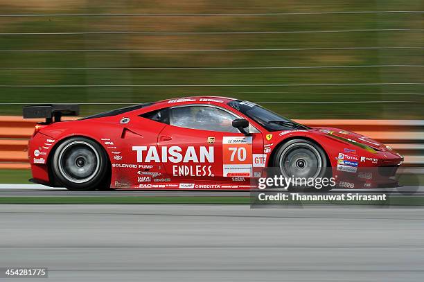 Akira Iida of Japan, Morris Chen go Germany and Ryohei Sakaguchi of Japan dives the Team Taisan Ken Endless Ferrari 458 GTE during the Asian Lemans...