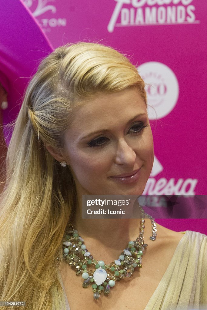 Paris Hilton Amnesia Store Appearance In Ibiza - August 27, 2014