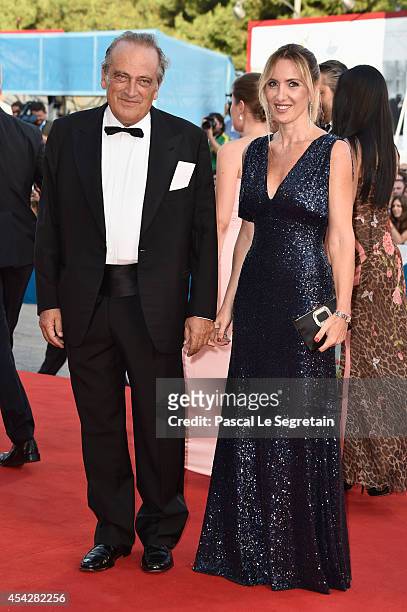 Luigi Abete and Desiree Colapietro Petrini attend the Opening Ceremony and 'Birdman' premiere during the 71st Venice Film Festival on August 27, 2014...