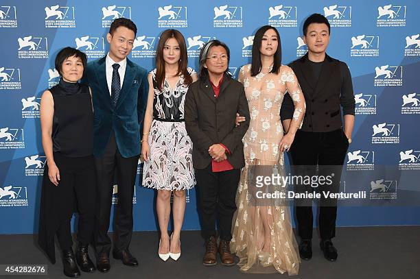 Producer Jojo Hui, actors Zhang Yi, Zhao Wei, director Peter Chan, actors Hao Lei and Tong Dawei attend 'Dearest' Photocall during the 71st Venice...