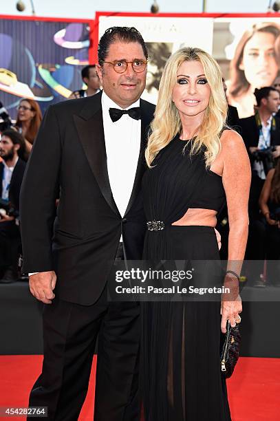 Marco De Benedetti and Paola Ferrari attend the Opening Ceremony and 'Birdman' premiere during the 71st Venice Film Festival on August 27, 2014 in...