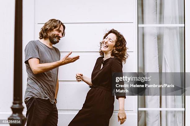 Writers Joanna Smith Rakoff & Frederic Beigbeder, who have both written books about J.D.Salinger are photographed for Paris Match on July 29, 2014 in...