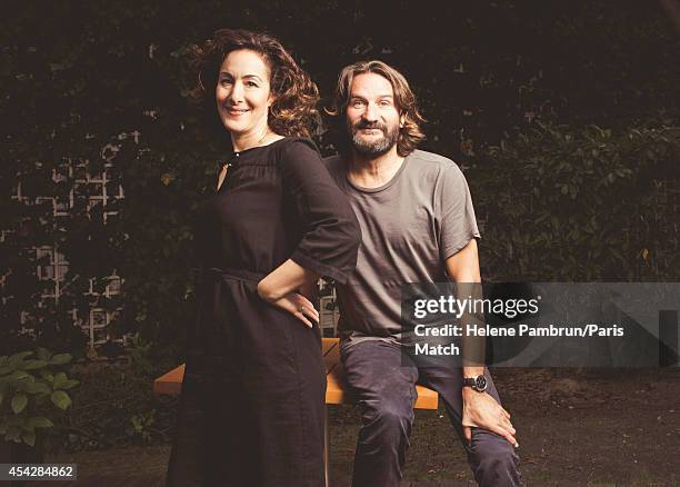 Writers Joanna Smith Rakoff & Frederic Beigbeder, who have both written books about J.D.Salinger are photographed for Paris Match on July 29, 2014 in...