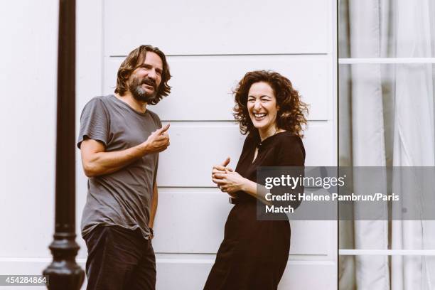 Writers Joanna Smith Rakoff & Frederic Beigbeder, who have both written books about J.D.Salinger are photographed for Paris Match on July 29, 2014 in...