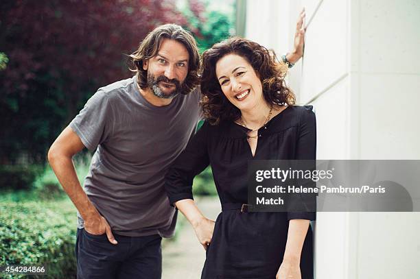 Writers Joanna Smith Rakoff & Frederic Beigbeder, who have both written books about J.D.Salinger are photographed for Paris Match on July 29, 2014 in...