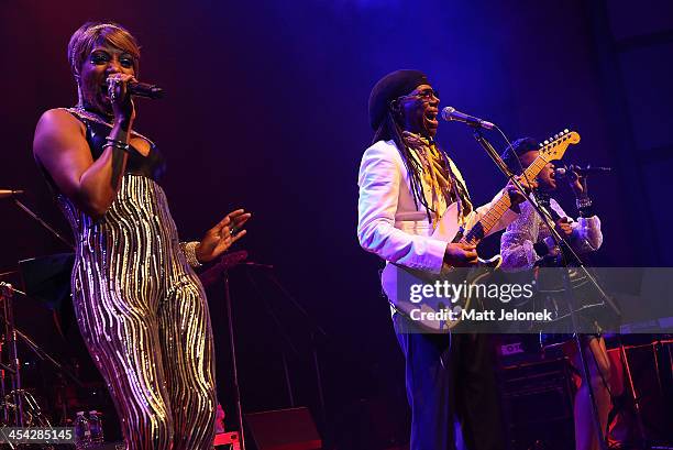 Kimberly Davis, Nile Rodgers and Folami Thompson and Chic perform on stage at the Astor Theatre on December 8, 2013 in Perth, Australia.