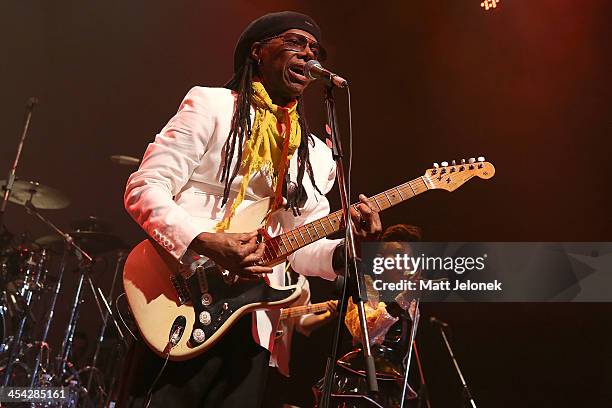 Nile Rodgers and Folami Thompson perform on stage at the Astor Theatre on December 8, 2013 in Perth, Australia.