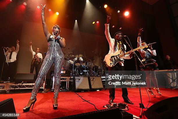 Kimberly Davis, Nile Rodgers and Folami Thompson and Chic perform on stage at the Astor Theatre on December 8, 2013 in Perth, Australia.