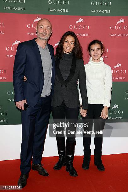 Franck Leboeuf, Betty Leboeuf and their daughter attend day 4 of the Gucci Paris Masters 2013 at Paris Nord Villepinte on December 8, 2013 in Paris,...