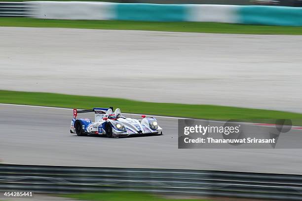 James Winslow of Great Britain and Tsujio Matsuda of Japan drives the KCMG Morgan-Nissan during the Asian Lemans Series on December 8, 2013 in...