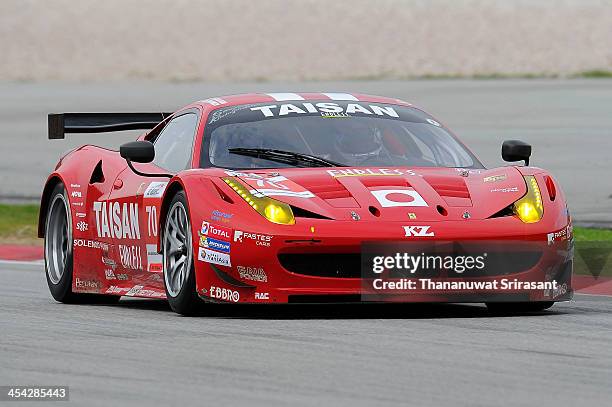 Akira Iida of Japan, Morris Chen go Germany and Ryohei Sakaguchi of Japan drives the Team Taisan Ken Endless Ferrari 458 GTE during the Asian Lemans...