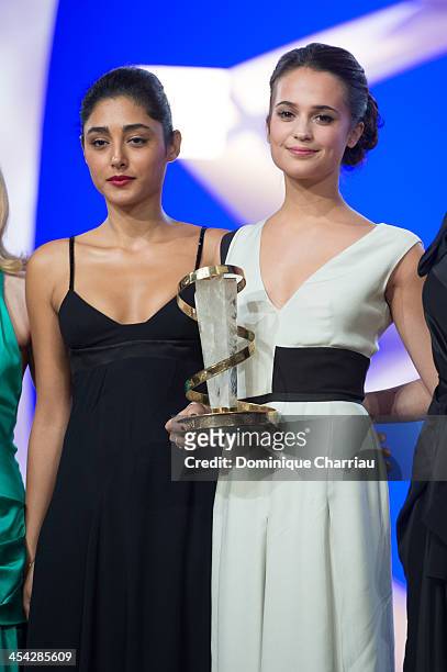 Golsshifteh Farhani poses with Alica Vikander awarded Best actress during the Award Ceremony of the 13th Marrakech International Film Festival on...