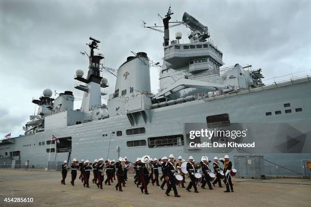 The Naval Brass Band plays ahead of the decommissioning ceremony of HMS Illustrious on August 28, 2014 in Portsmouth, England. The HMS Illustrious...