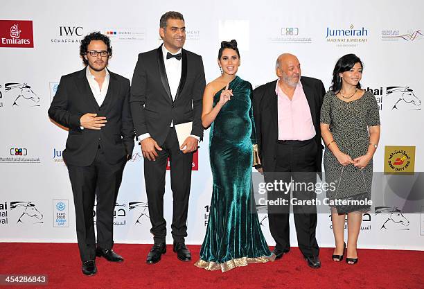 Producer Mohamed Samir, actors Hany Adel, Yasmin Raes, director Mohamed Khan and screenwriter Wessam Soliman attend "The Factory Girl" premiere...