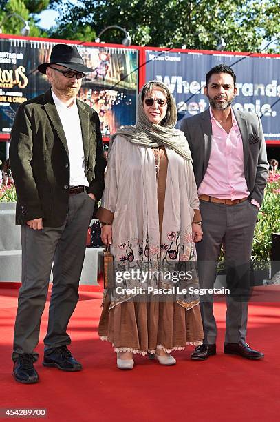 Actor Habib Rezaei, director Rakhshan Bani-Etemad and actor Peyman Moaadi attend the "Tales" premiere during the 71st Venice Film Festival on August...