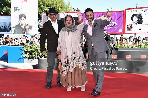 Actor Habib Rezaei, director Rakhshan Bani-Etemad and actor Peyman Moaadi attend the "Tales" premiere during the 71st Venice Film Festival on August...