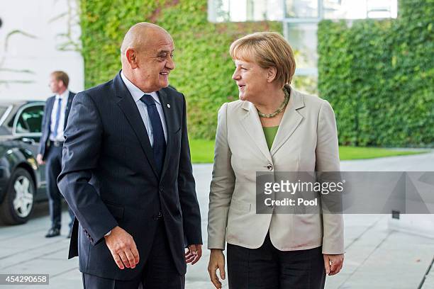 German Chancellor Angela Merkel welcomes Prime Minister of Bosnia and Herzegovina Vjekoslav Bevanda to the German government Balkan conference at the...