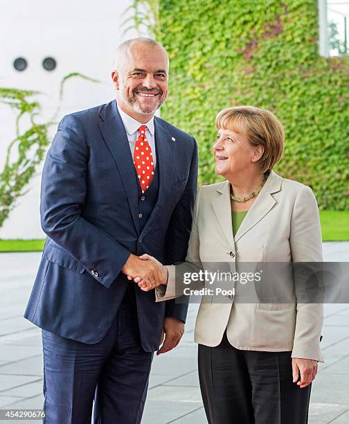 German Chancellor Angela Merkel welcomes Prime Minister of Albania Edi Rama to the German government Balkan conference at the Chancellery on August...