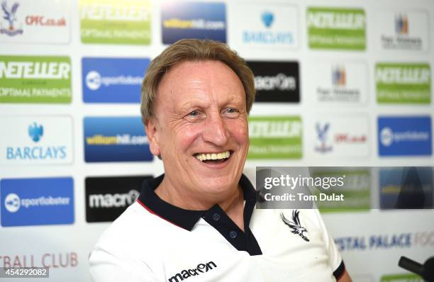 Newly appointed manager of Crystal Palace Neil Warnock speaks to the media during a press conference at Crystal Palace Training Ground on August 28,...