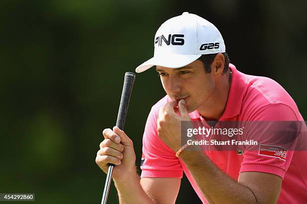 Julien Quesne of France lines up a putt during the first round of the 71st Italian Open Damiani at Circolo Golf Torino on August 28, 2014 in Turin,...