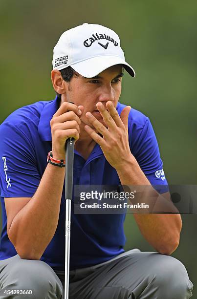 Matteo Manassero of Italy ponders a shot during the first round of the 71st Italian Open Damiani at Circolo Golf Torino on August 28, 2014 in Turin,...