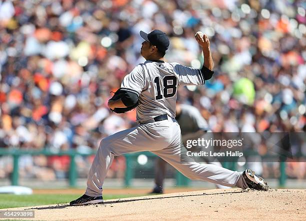 Hiroki Kuroda of the New York Yankees pitches during the first inning of the game against the Detroit Tigers at Comerica Park on August 28, 2014 in...