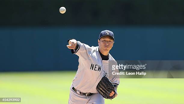 Hiroki Kuroda of the New York Yankees warms up prior to the start oif the first inning of the game against the Detroit Tigers at Comerica Park on...