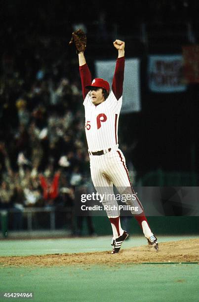 Tug McGraw of the Philadelphia Phillies leaps in the air after the Phillies won the 1980 World Series during World Series game six between the Kansas...