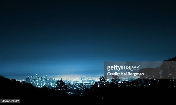 downtown los angeles from hollywood hills - city of los angeles night stock pictures, royalty-free photos & images