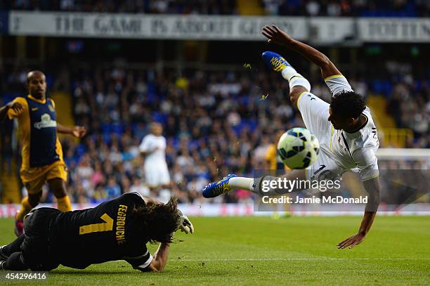 Kyle Naughton of Spurs is brought down in the area by Karim Fegrouche of AEL Limassol to win a penalty during the UEFA Europa League Qualifying...