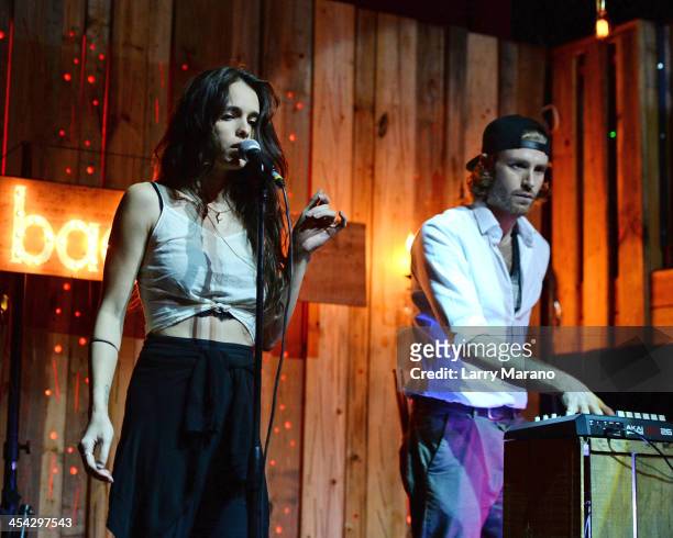 Chelsea Tyler and Jon Foster of Badbad perform at Stache on December 7, 2013 in Fort Lauderdale, Florida.
