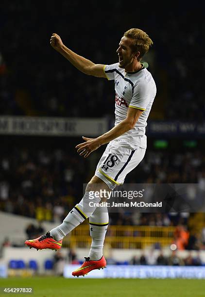 Harry Kane of Spurs celebrates scoring their first goal during the UEFA Europa League Qualifying Play-Offs Round Second Leg match between Tottenham...
