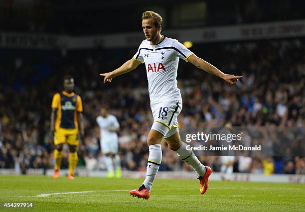 Harry Kane of Spurs celebrates scoring their first goal during the UEFA Europa League Qualifying Play-Offs Round Second Leg match between Tottenham...