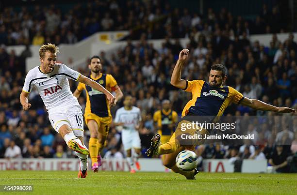 Harry Kane of Spurs scores their first goal during the UEFA Europa League Qualifying Play-Offs Round Second Leg match between Tottenham Hotspur and...