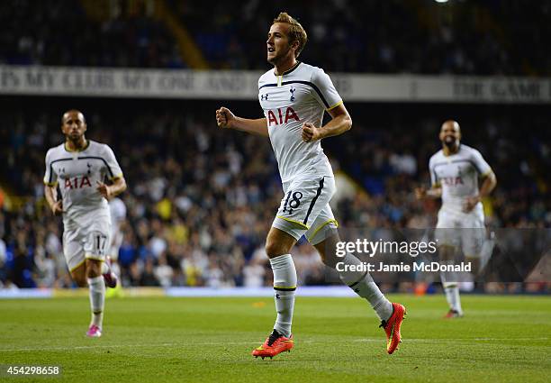 Harry Kane of Spurs celebrates scoring their first goal during the UEFA Europa League Qualifying Play-Offs Round Second Leg match between Tottenham...