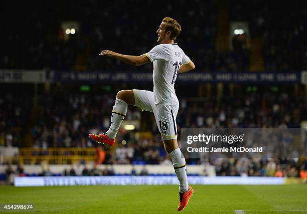 Harry Kane of Spurs celebrates scoring their first goal during the UEFA Europa League Qualifying Play-Offs Round Second Leg match between Tottenham...