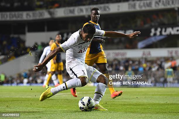 Tottenham Hotspur's Brazilian midfielder Paulinho scores their second goal during the UEFA Europa League qualifying round play-off second-leg...